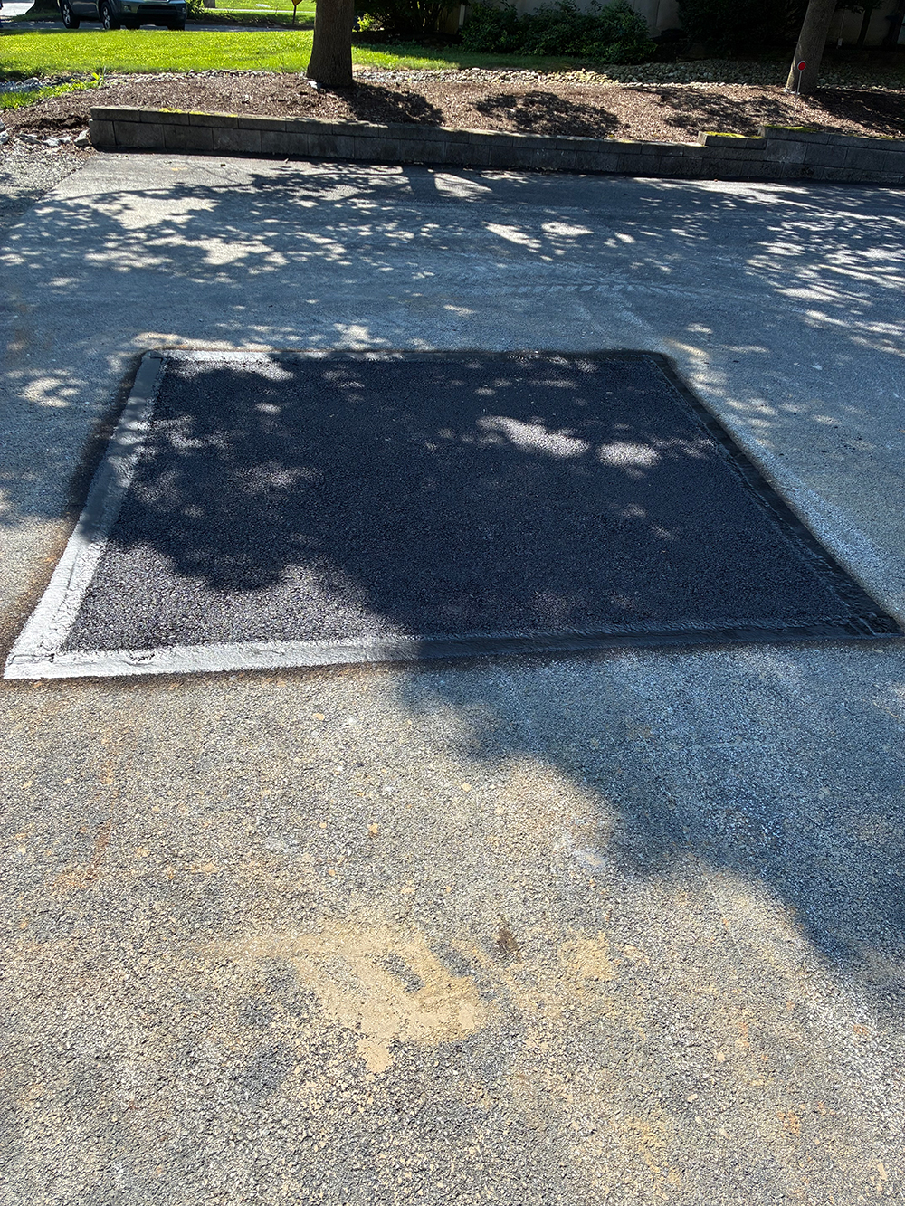 Restoring Safe Asphalt in Hershey, PA: A Hidden Sinkhole Repair Story