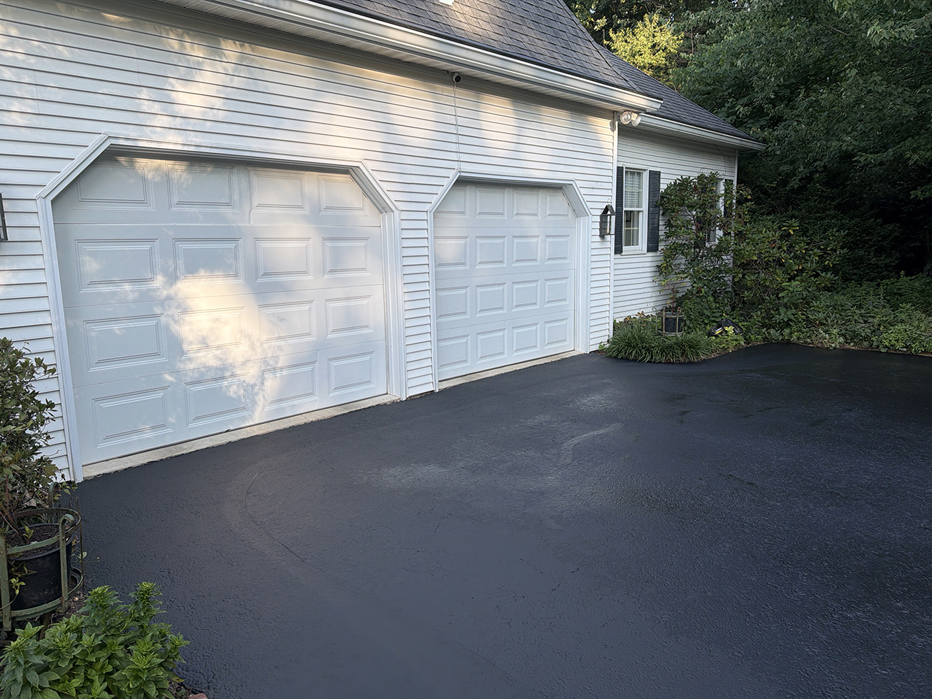 Restoring a Long, Winding Palmyra Driveway With Crack Filling and Sealcoating
