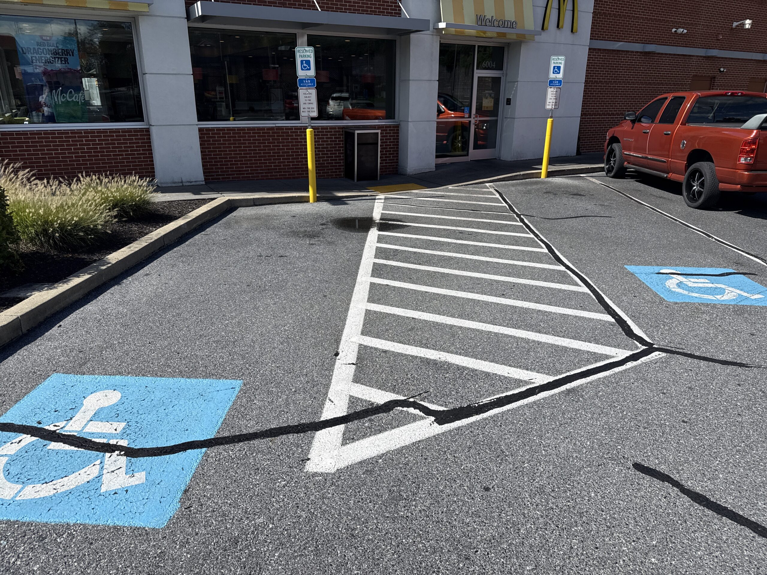 Crack Sealing at a Harrisburg, PA McDonald’s With Divided Access Lanes